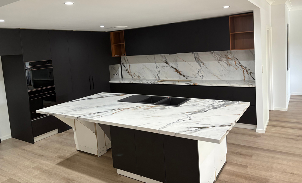 A Kitchen With Modern Benchtops