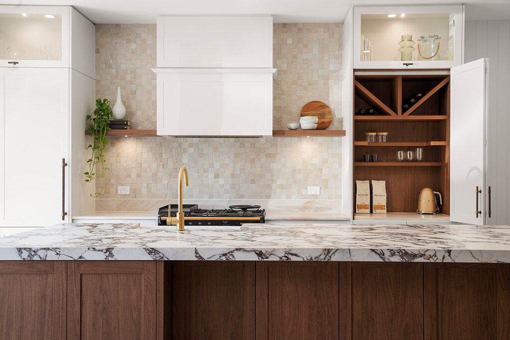 Modern Kitchen With Marble Island and Light Tile Backsplash — Vivid Stoneworks in Thornton, NSW