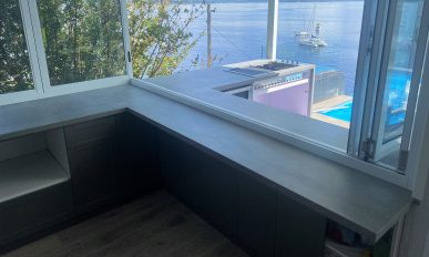 Stone BBQ Surrounds in Waterfront Newcastle Home — Vivid Stoneworks in Thornton, NSW